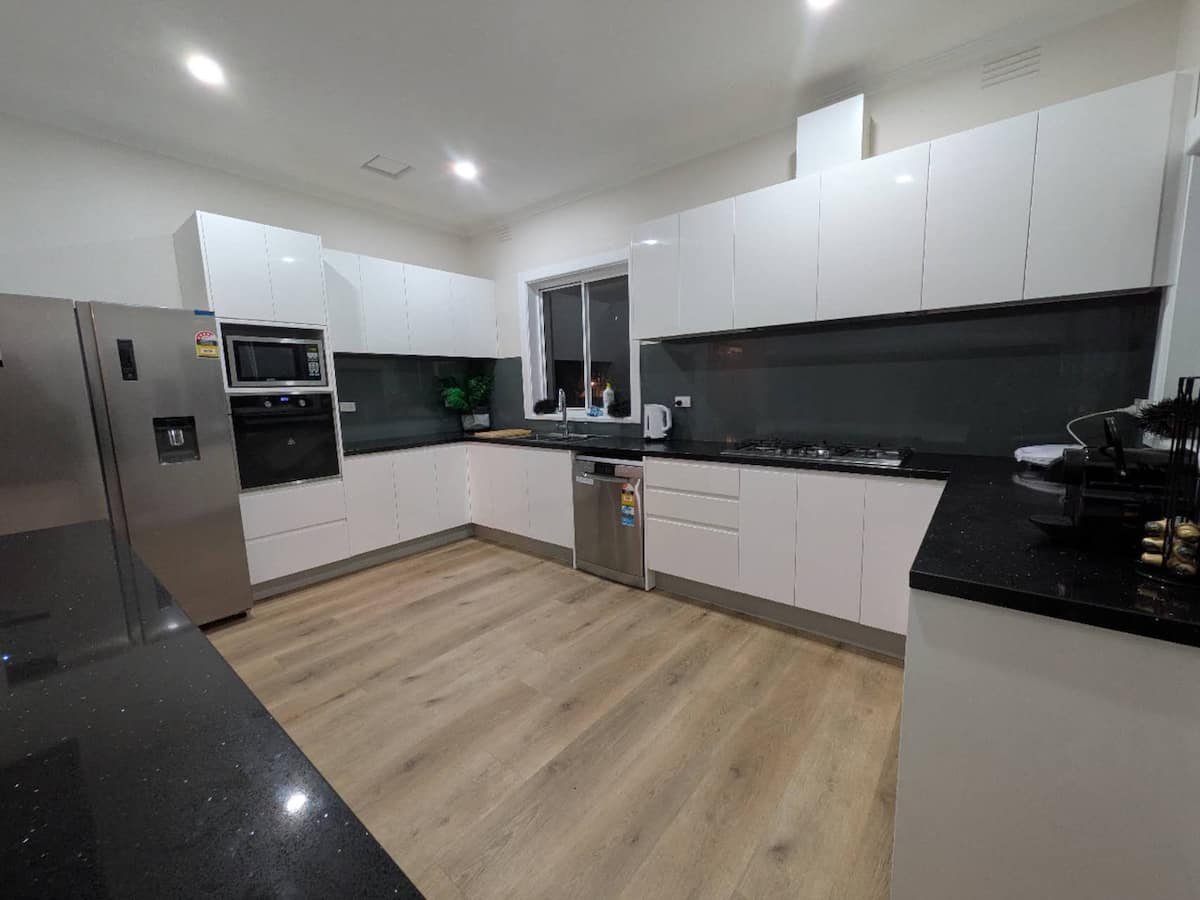 The renovated kitchen and open-plan living at Bonbeach Oasis